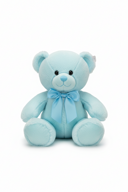 Light blue teddy bear with a bow on a white background
