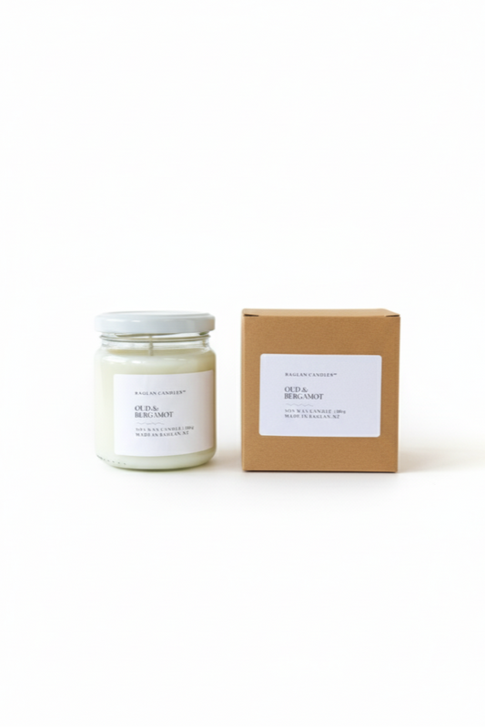 Candle jar and box on a white background