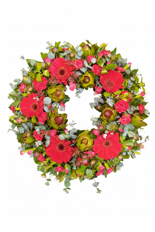 Floral wreath with pink and green flowers on a white background