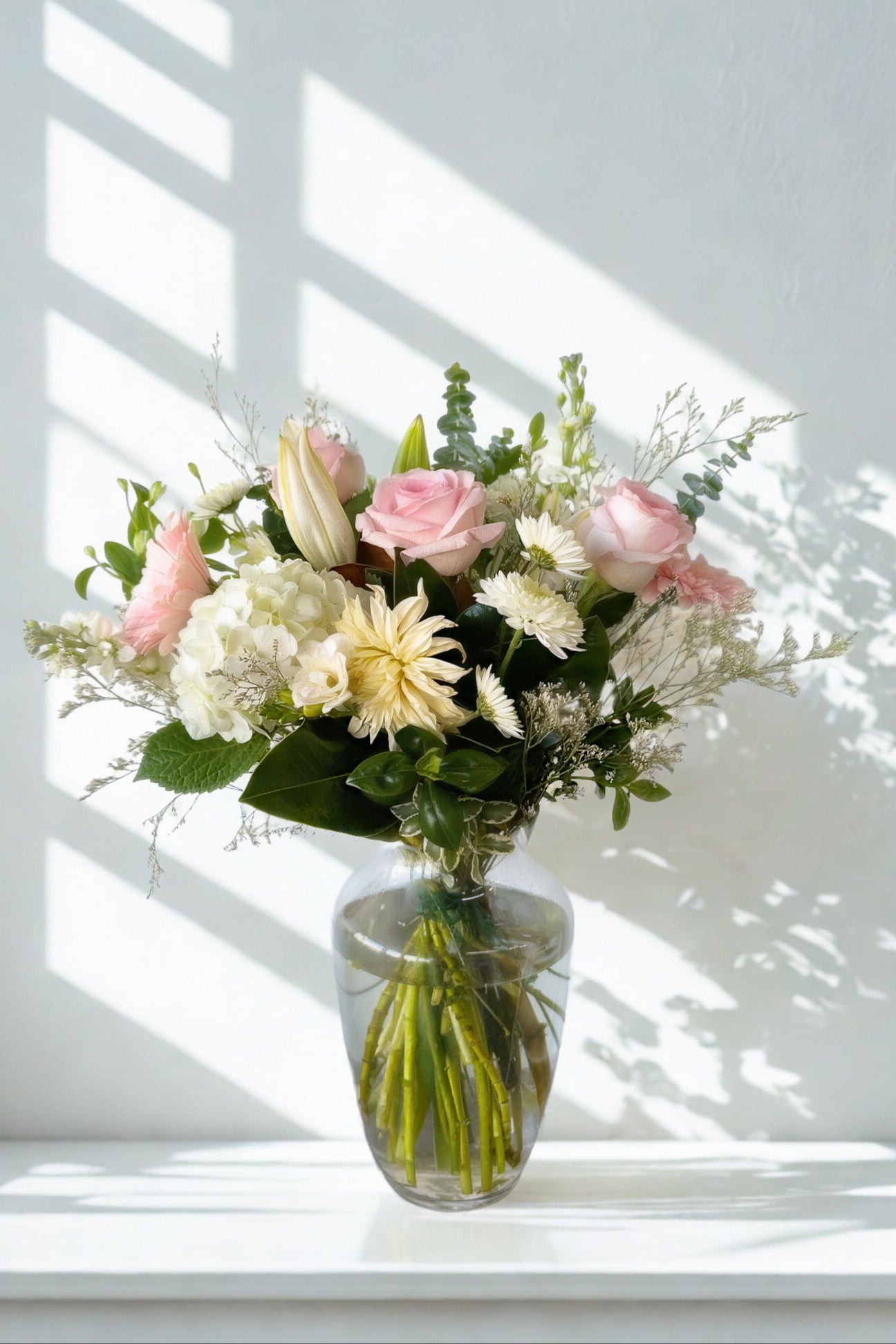 pink and white in a vase
