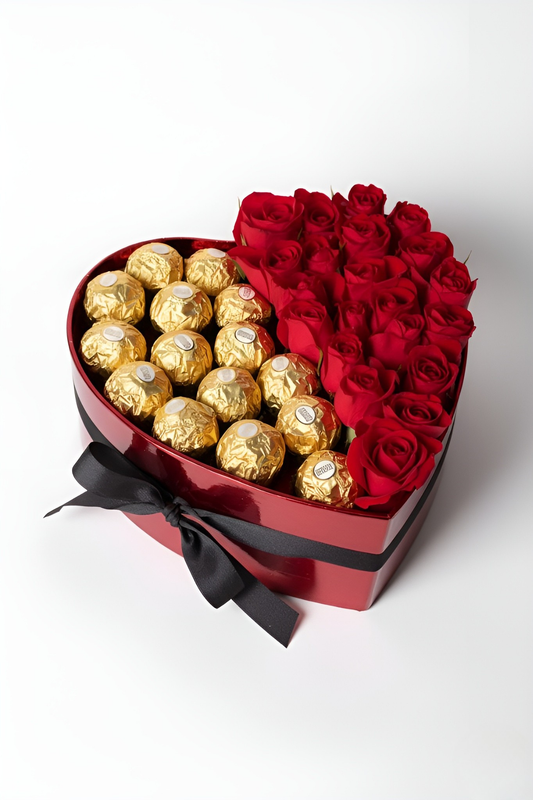 Heart-shaped box filled with red roses and gold Ferrero Rocher chocolates on a white background