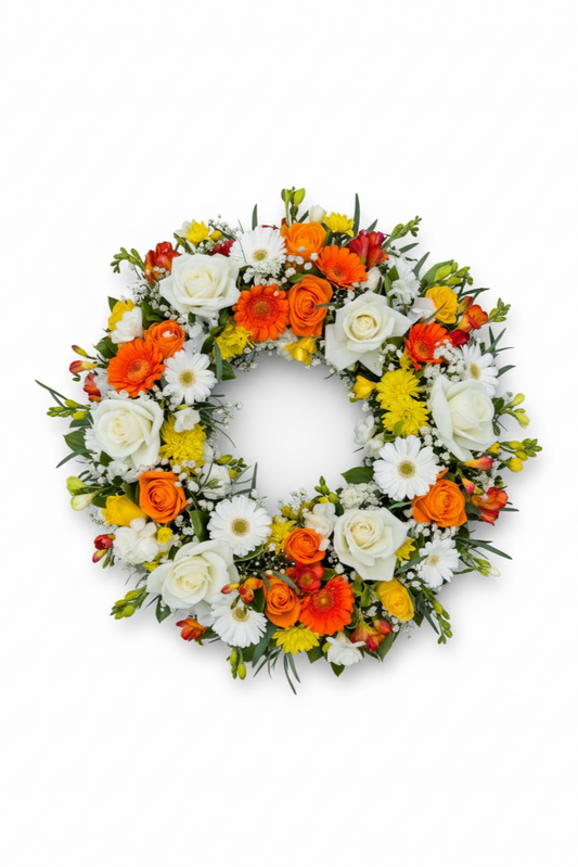 Floral wreath with orange, yellow, and white flowers on a white background